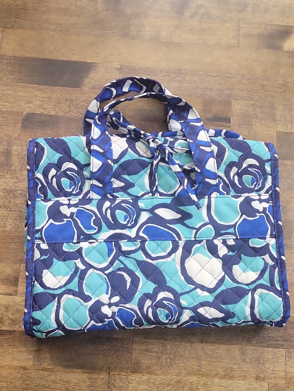 Modella Quilted Floral Toiletry Bag in Blue and Teal Hanging